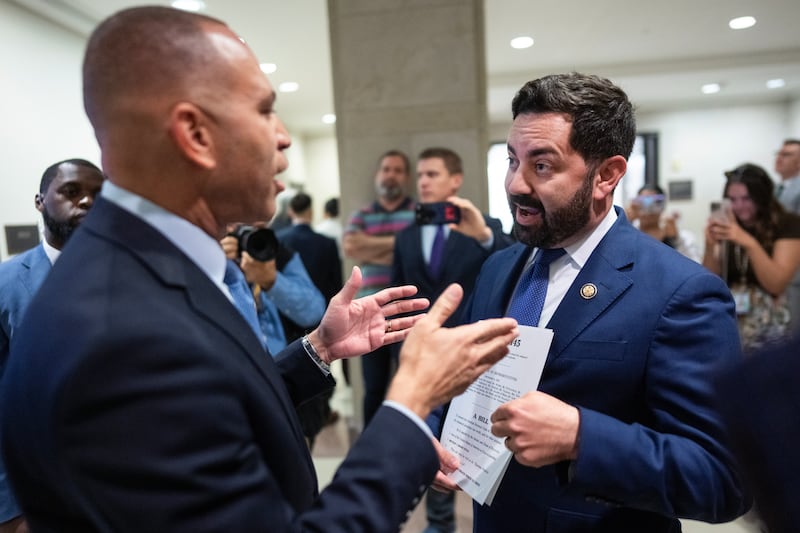 House Minority Leader Hakeem Jeffries told Rep. Mike Lawler that he was embarrassing himself and asked if he had gotten the president's permission after the GOP lawmaker confronted him outside his press conference on October 8, 2025 about his temporary ACA tax credits extension legislation.