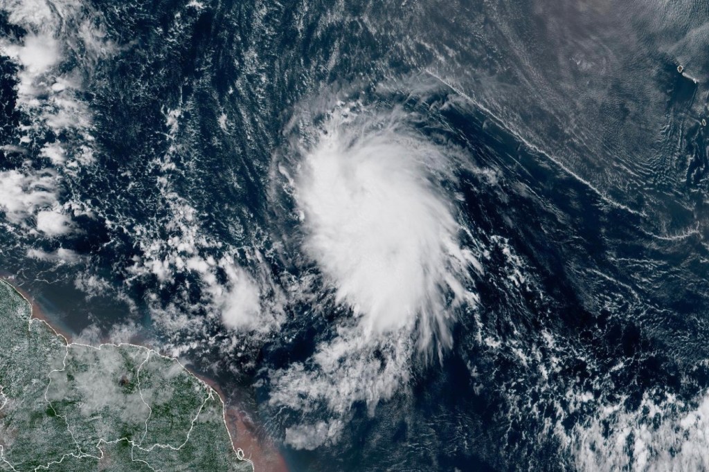 This satellite image provided by the National Oceanic and Atmospheric Administration (NOAA) shows Tropical Storm Jerry in the Atlantic Ocean, Tuesday, Oct. 7, 2025. 