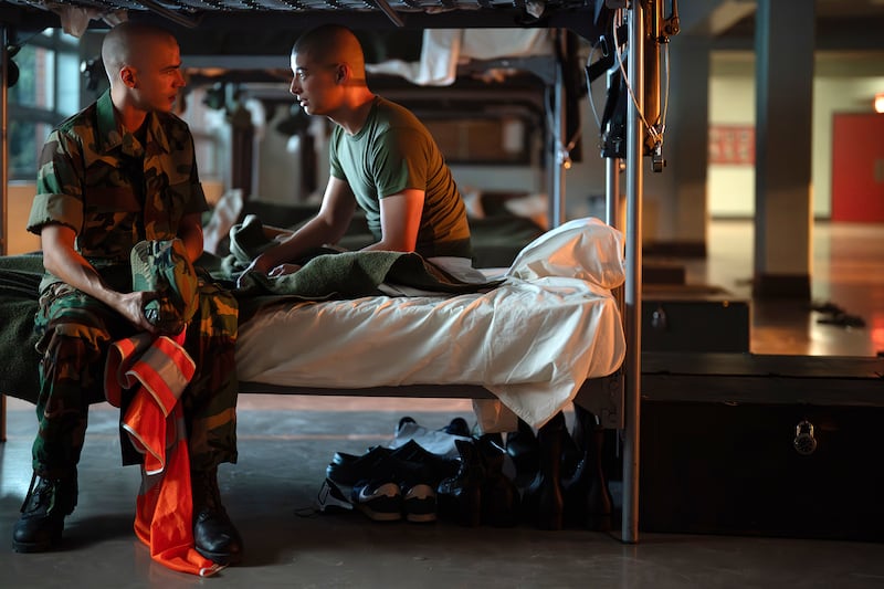 (L-R) Miles Heizer as Cameron Cope and Liam Oh as Ray McAffey in Boots.