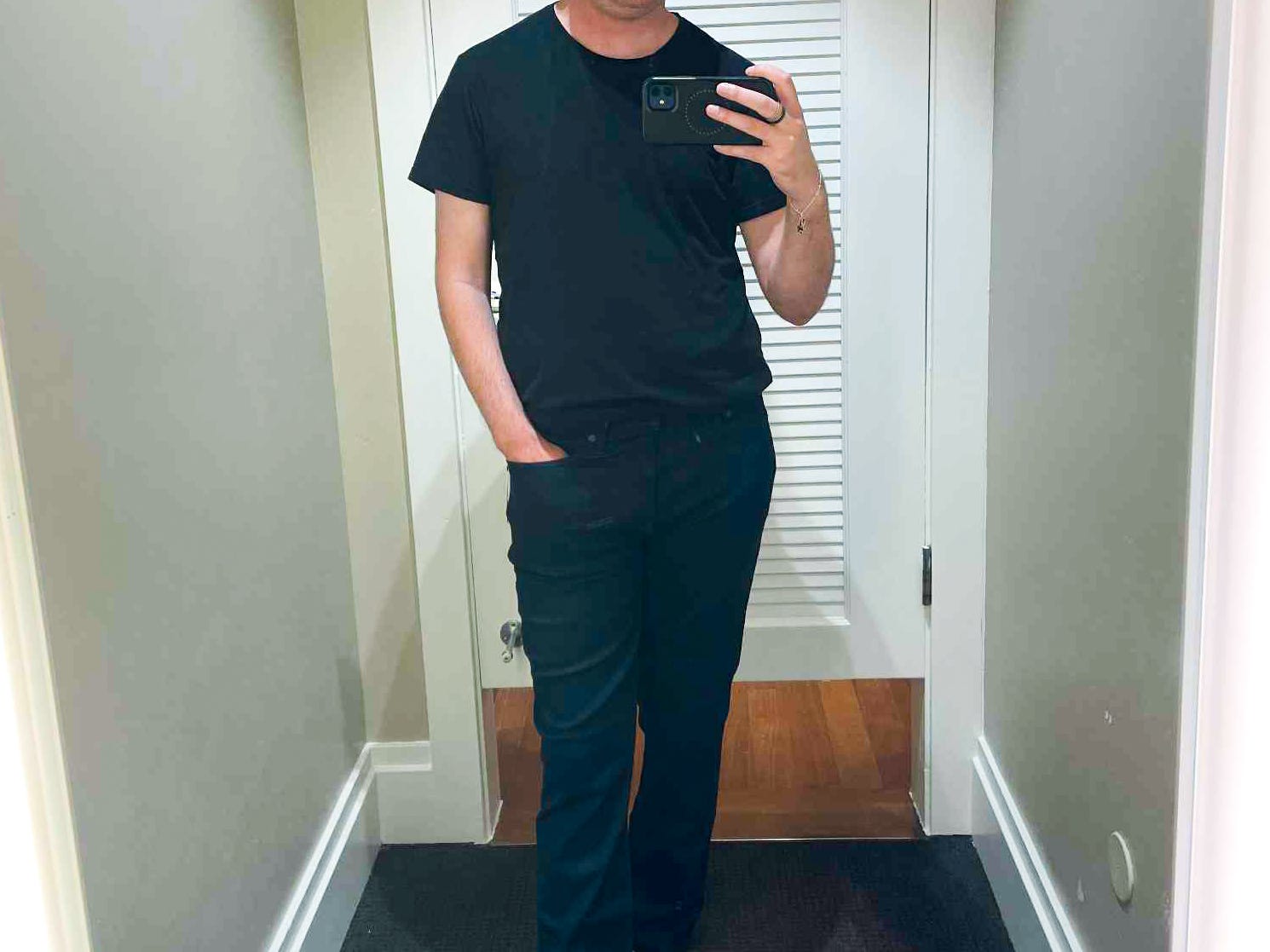 Mike taking a mirror picture in a Banana Republic fitting room.