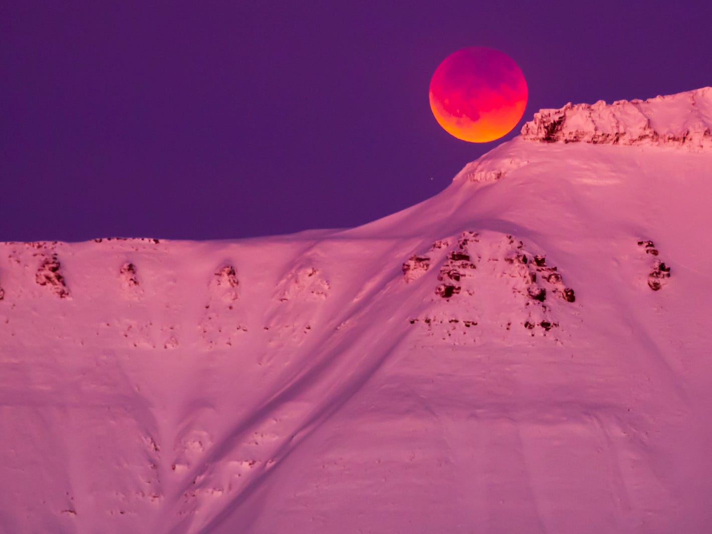 A super blue blood moon is seen from Longyearbyen, Svalbard, Norway, January 31, 2018.