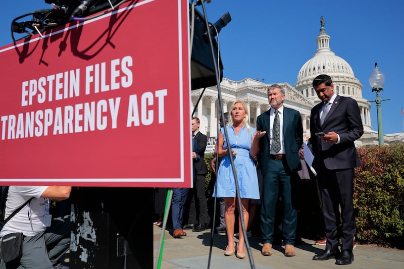 Rep. Marjorie Taylor Greene, Rep. Thomas Massie and Rep. Ro Khanna look on during a news conference with victims of disgraced financier and sex trafficker Jeffrey Epstein outside the U.S. Capitol on September 3, 2025 in Washington, D.C.