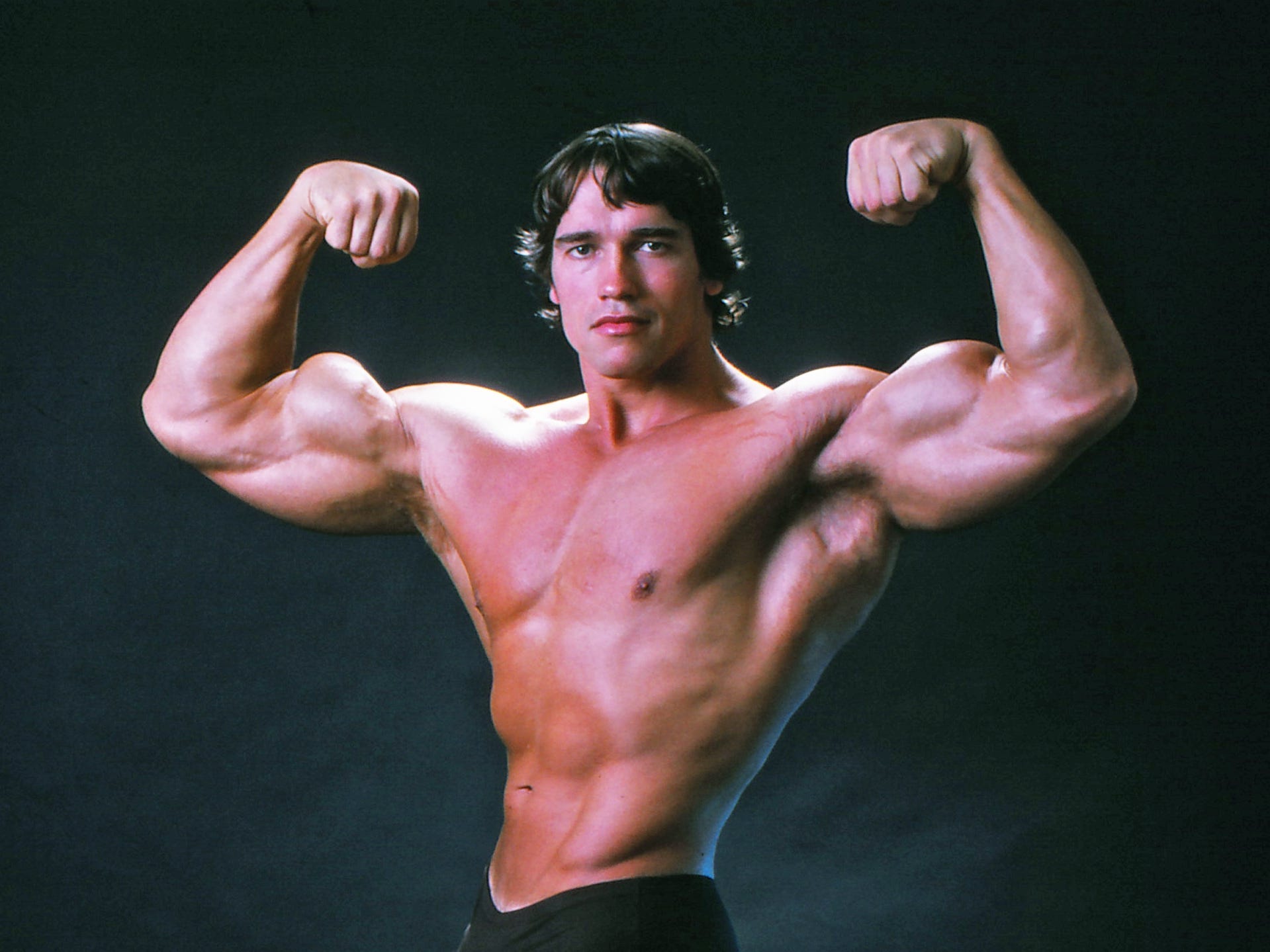 Young Arnold Schwarzenegger as a bodybuilder