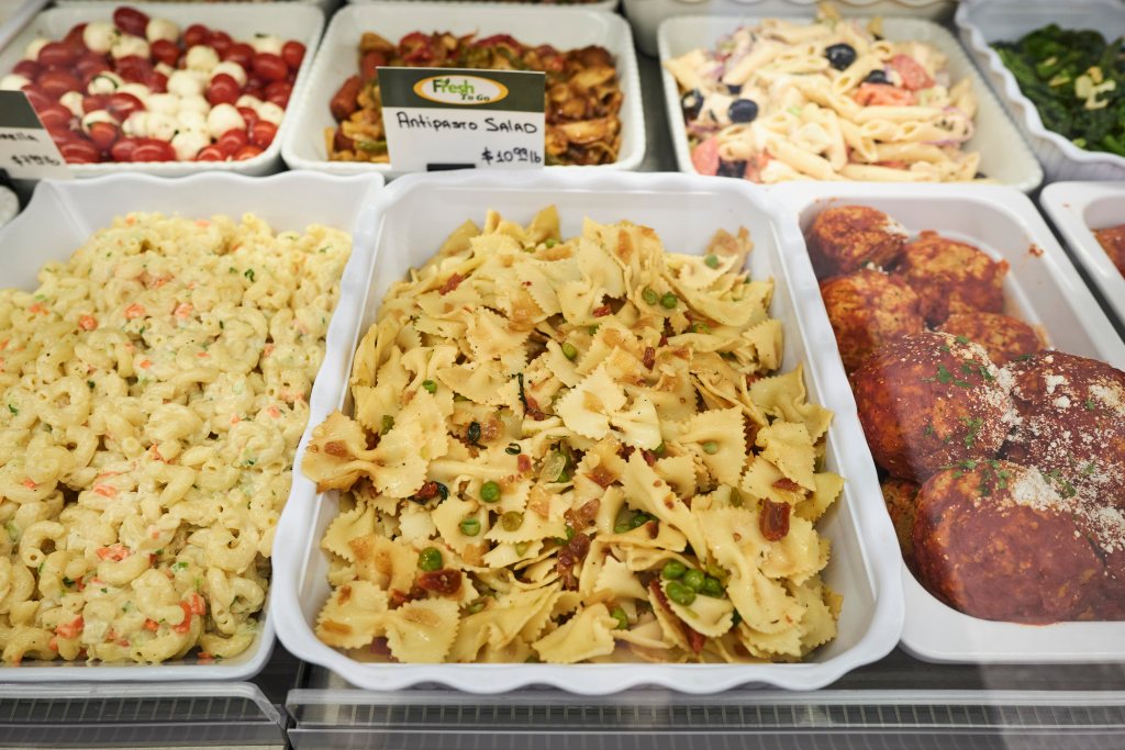 Pasta behind display counter.
