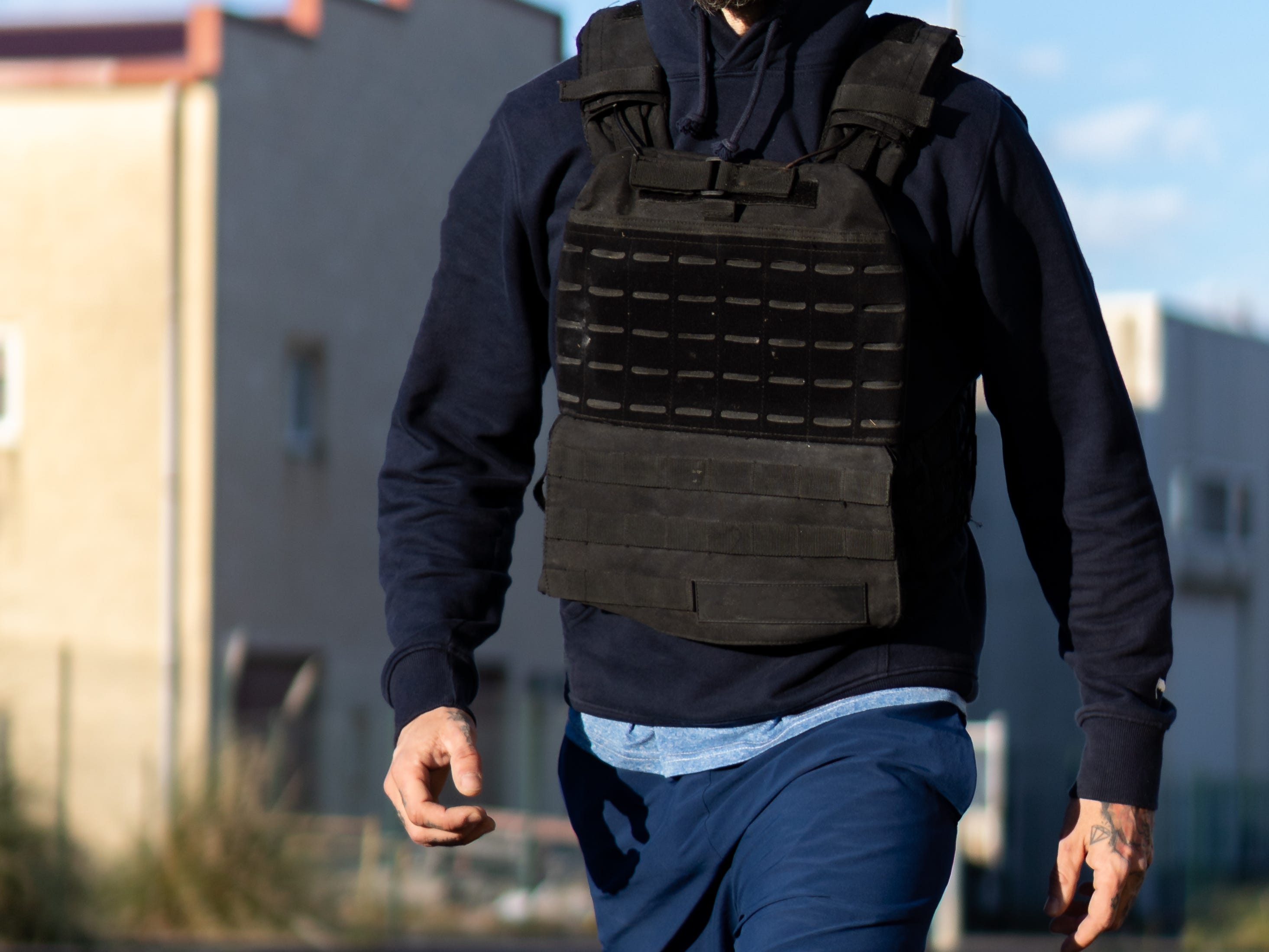A man wearing a weighted vest