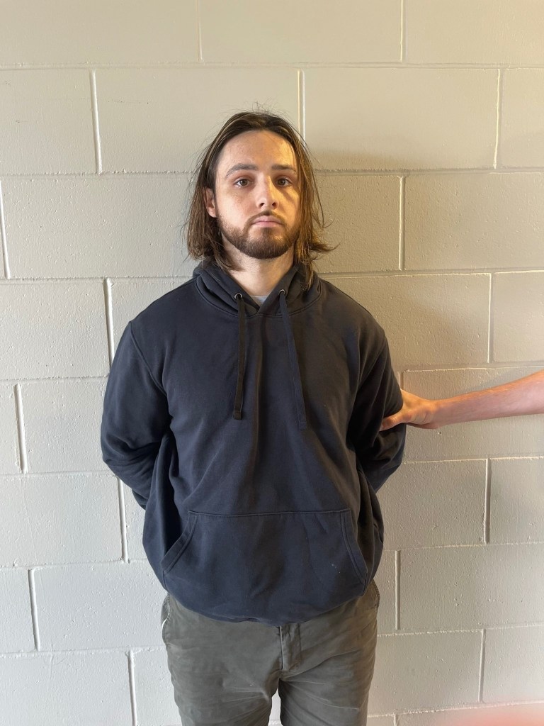 Jonathan Rinderknecht poses for a mugshot after being arrested on suspicion of starting the Palisades Fire.