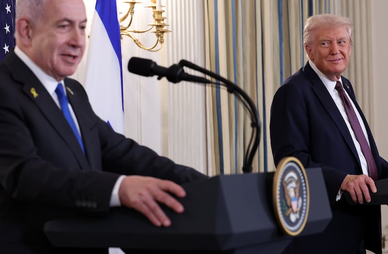 President Donald Trump looks on as Israeli Prime Minister Benjamin Netanyahu delivers remarks during a joint news conference at the White House on September 29, 2025 in Washington, D.C.