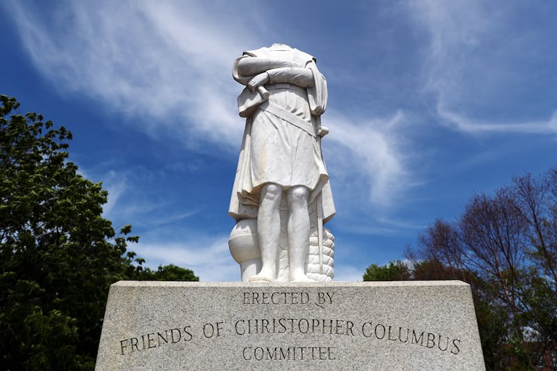 A statue depicting Christopher Columbus is seen with its head removed at Christopher Columbus Waterfront Park on June 10, 2020 in Boston, Massachusetts.