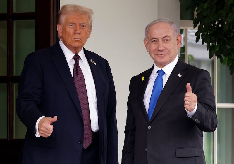 President Donald Trump (L) greets Israeli Prime Minister Benjamin Netanyahu as he arrives at the White House on September 29, 2025 in Washington, DC.
