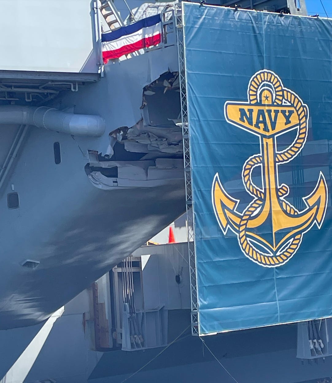 A photo shows damage to the USS Harry S. Truman in October.