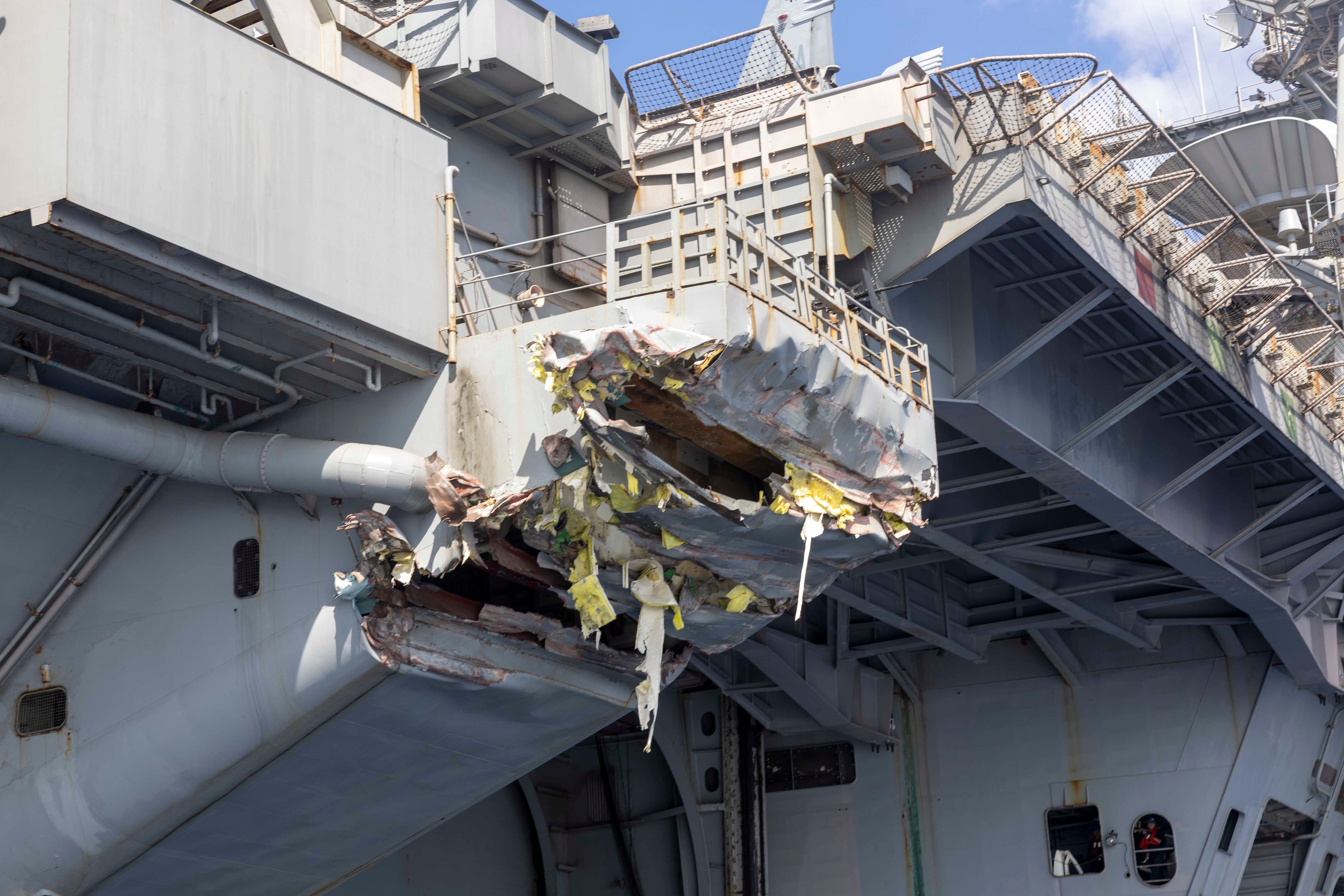 Exterior damage of USS Harry S. Truman viewed from a ship's rigid-hull inflatable boat following a collision with merchant vessel Besiktas-M, Feb. 12, while operating in the vicinity of Port Said, Egypt.