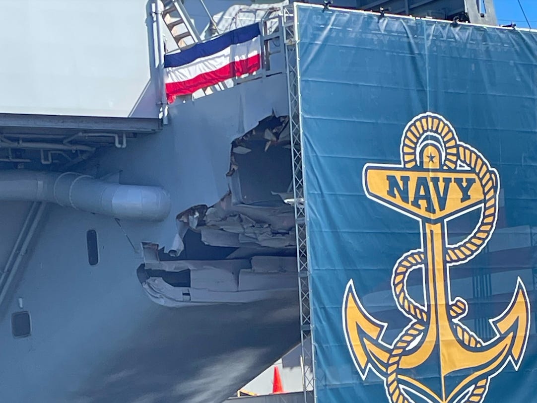 A photo shows damage to the USS Harry S. Truman in October.