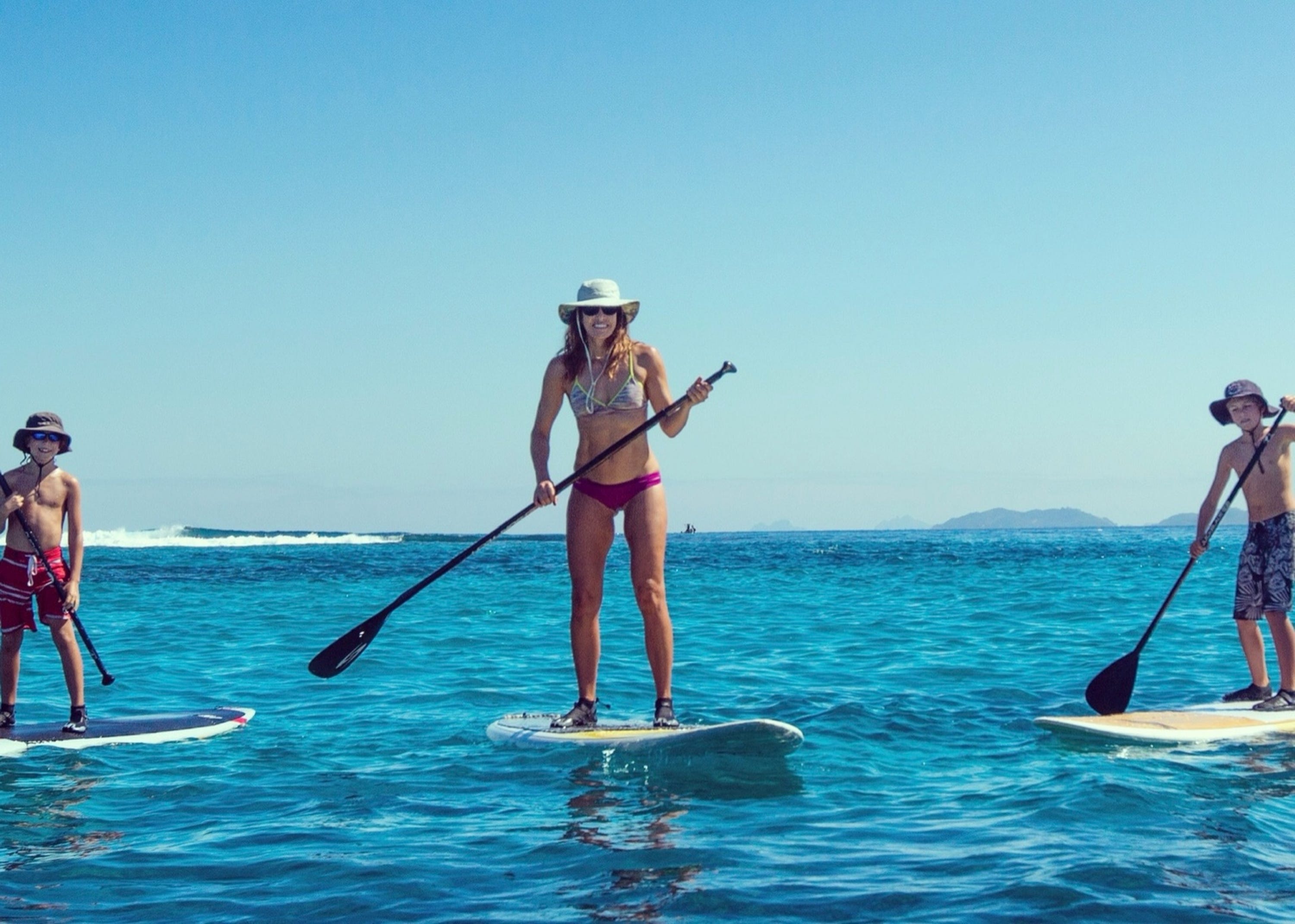 The author and her sons paddleboarding.
