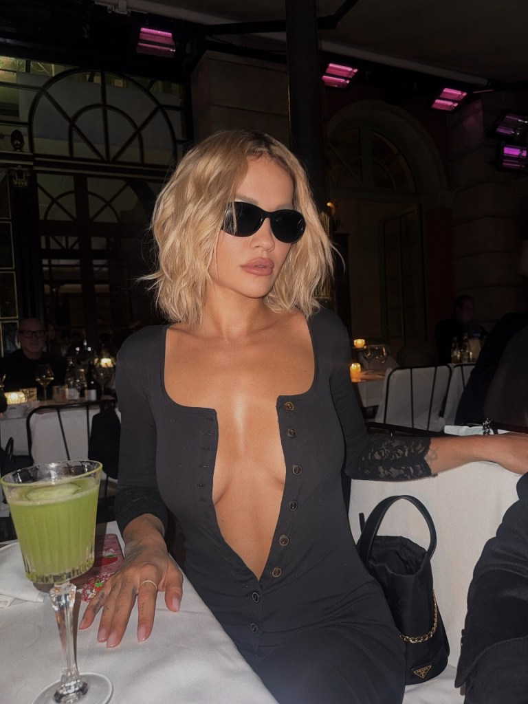 Rita Ora decides to be less buttoned-up while out on the town during Paris fashion week.
