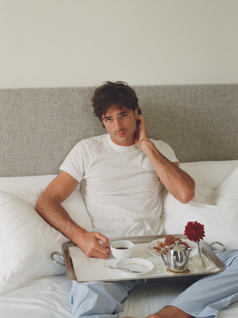 “Euphoria” star Jacob Elordi takes a coffee break during shooting his ad campaign for  Cartier’s LOVE bracelet.

