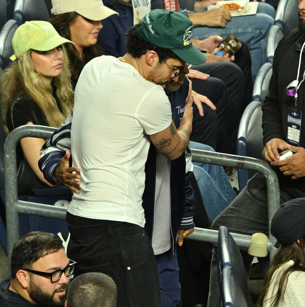 Bad Bunny (in white tee) and Spike Lee’s wholesome moment at the Yankees playoff game in The Bronx reminds us that sports brings everyone together.
