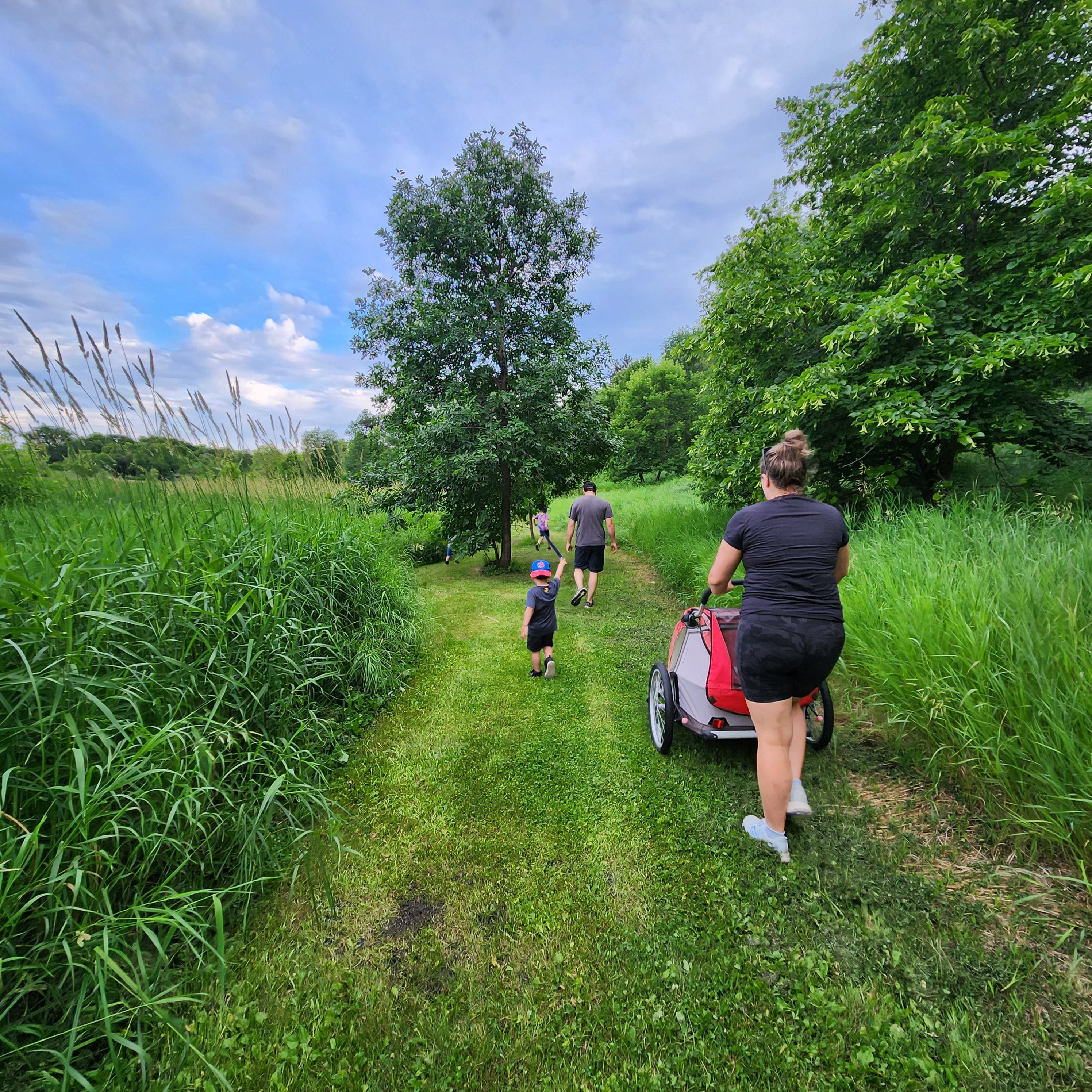 Family walking on trail