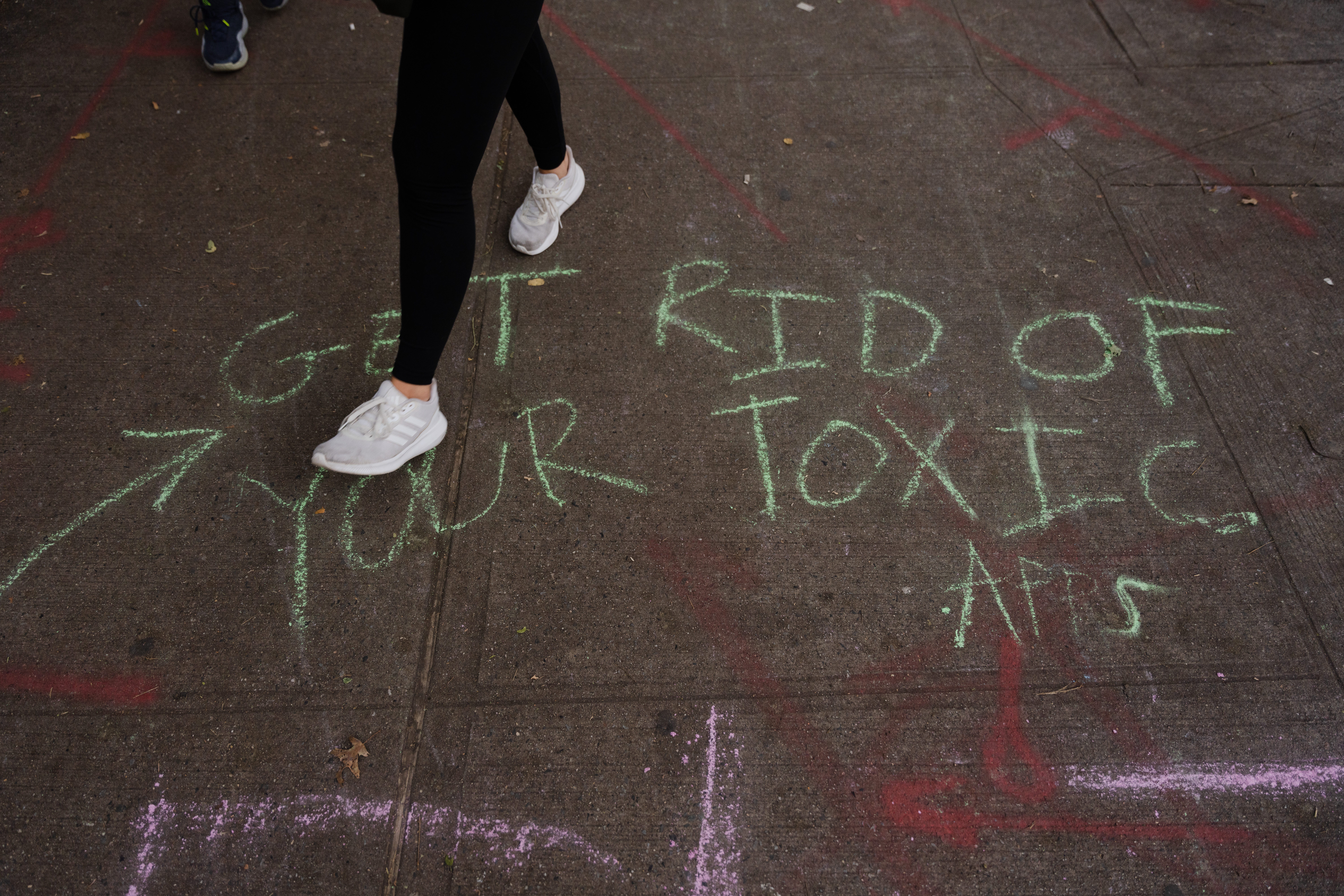 Chalk writing on sidewalk