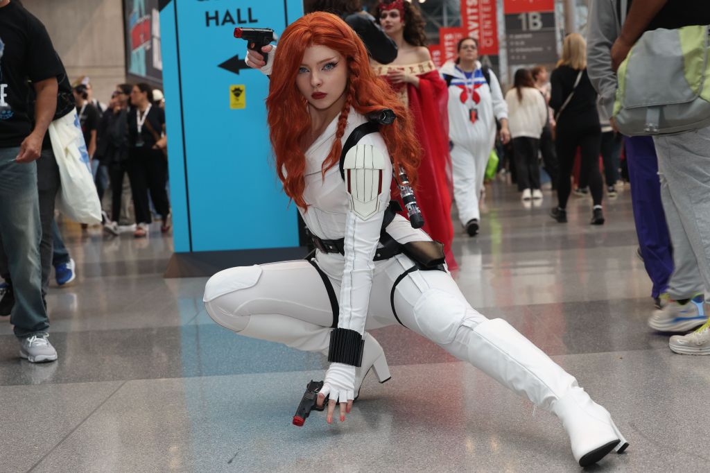 A cosplayer dressed as The Black Widow at New York Comic Con 2025