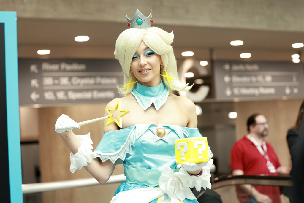 A cosplayer posed as Rosalina from Super Mario Galaxy at New York Comic Con 2025