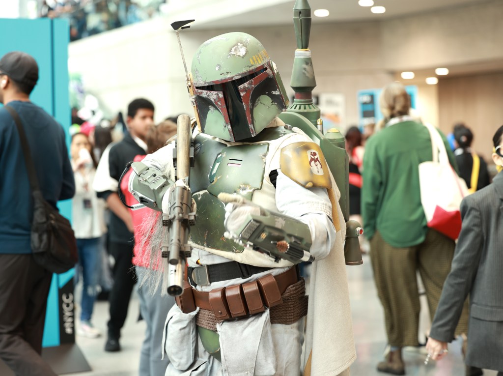 A cosplayer posed as Boba Fett from Star Wars at New York Comic Con 2025