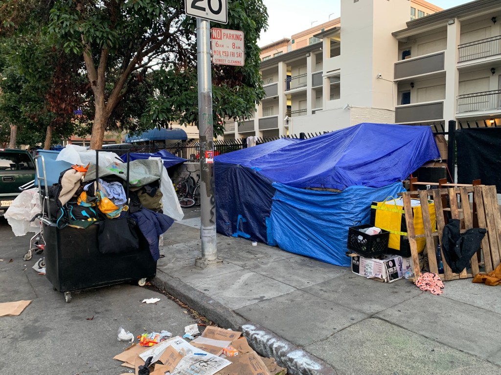 Homeless encampment on a San Francisco sidewalk.