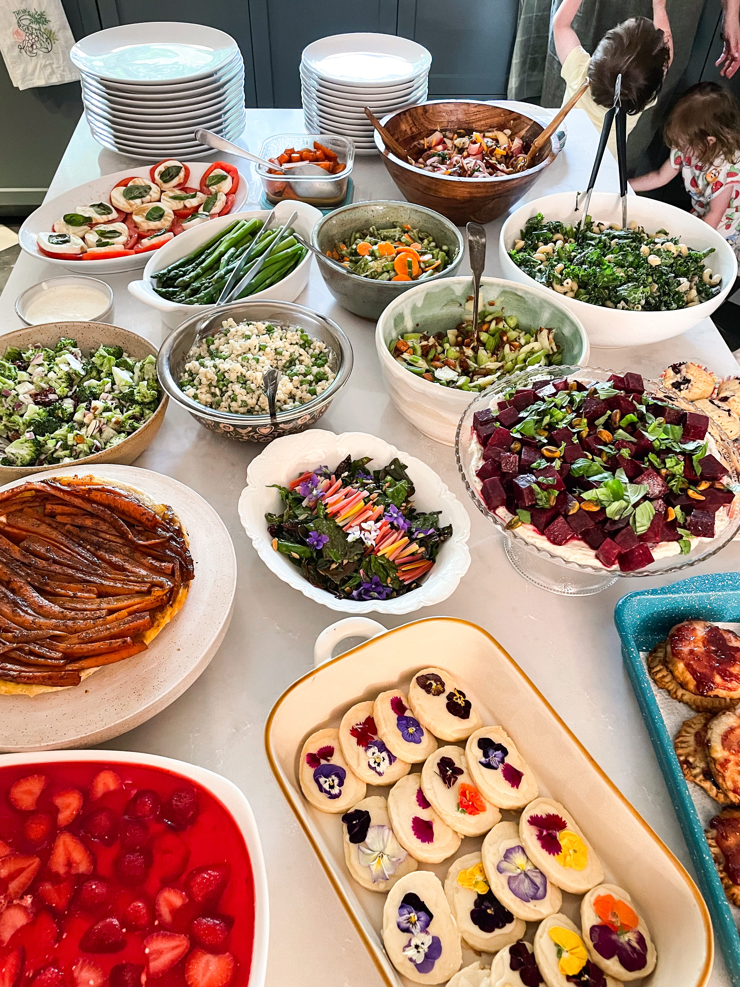 Colorful dishes made with fruits and vegetables in a buffet on a table.