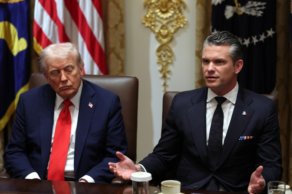 President Trump and U.S. Secretary of War Pete Hegseth at a cabinet meeting.