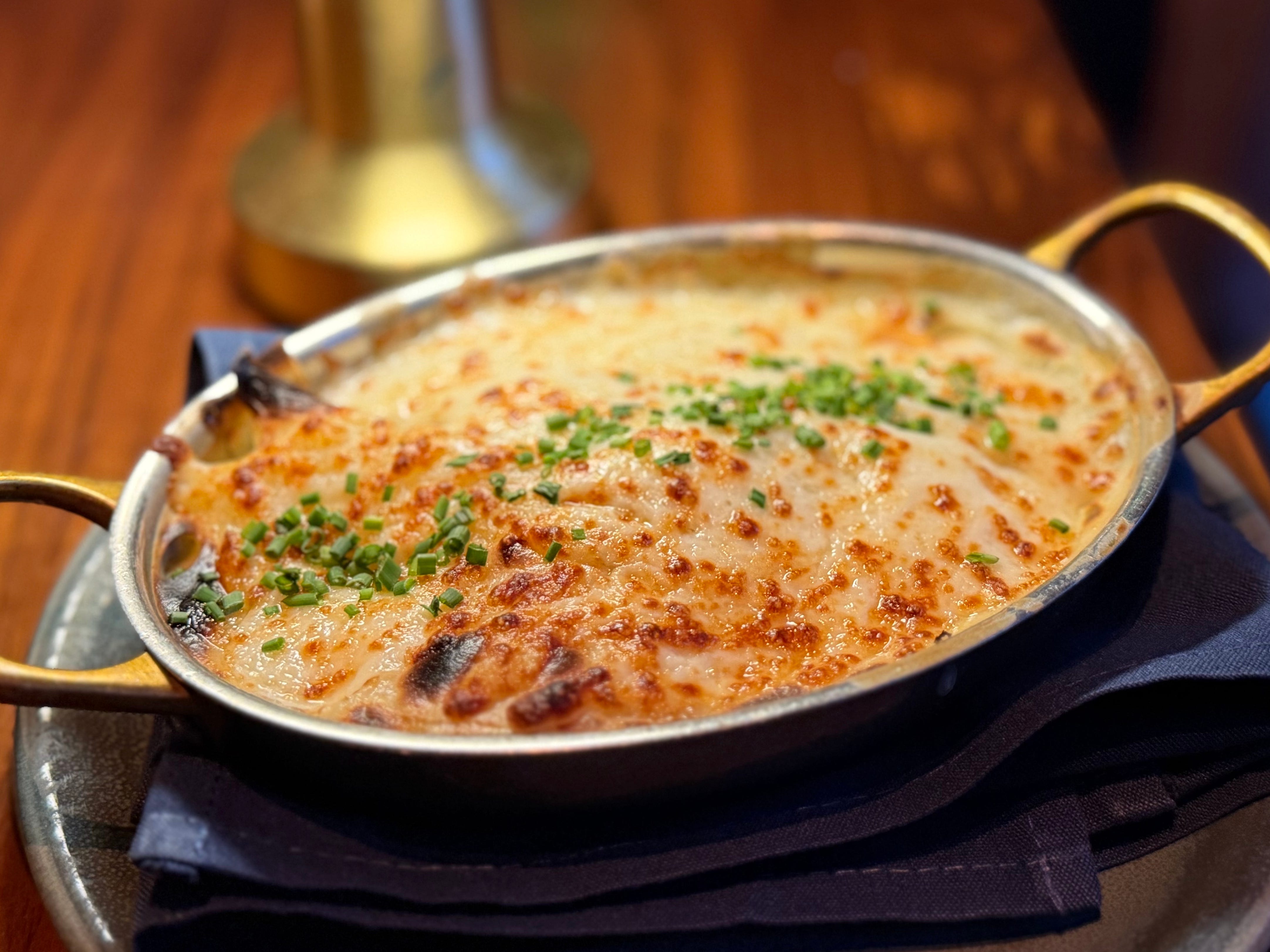 A plate of truffle potato gratin.