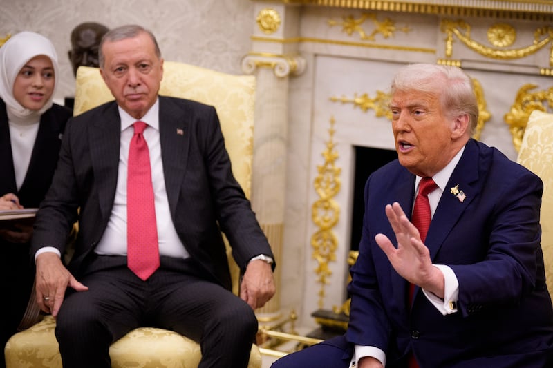 U.S. President Donald Trump, accompanied by President of Turkey Recep Tayyip Erdogan.