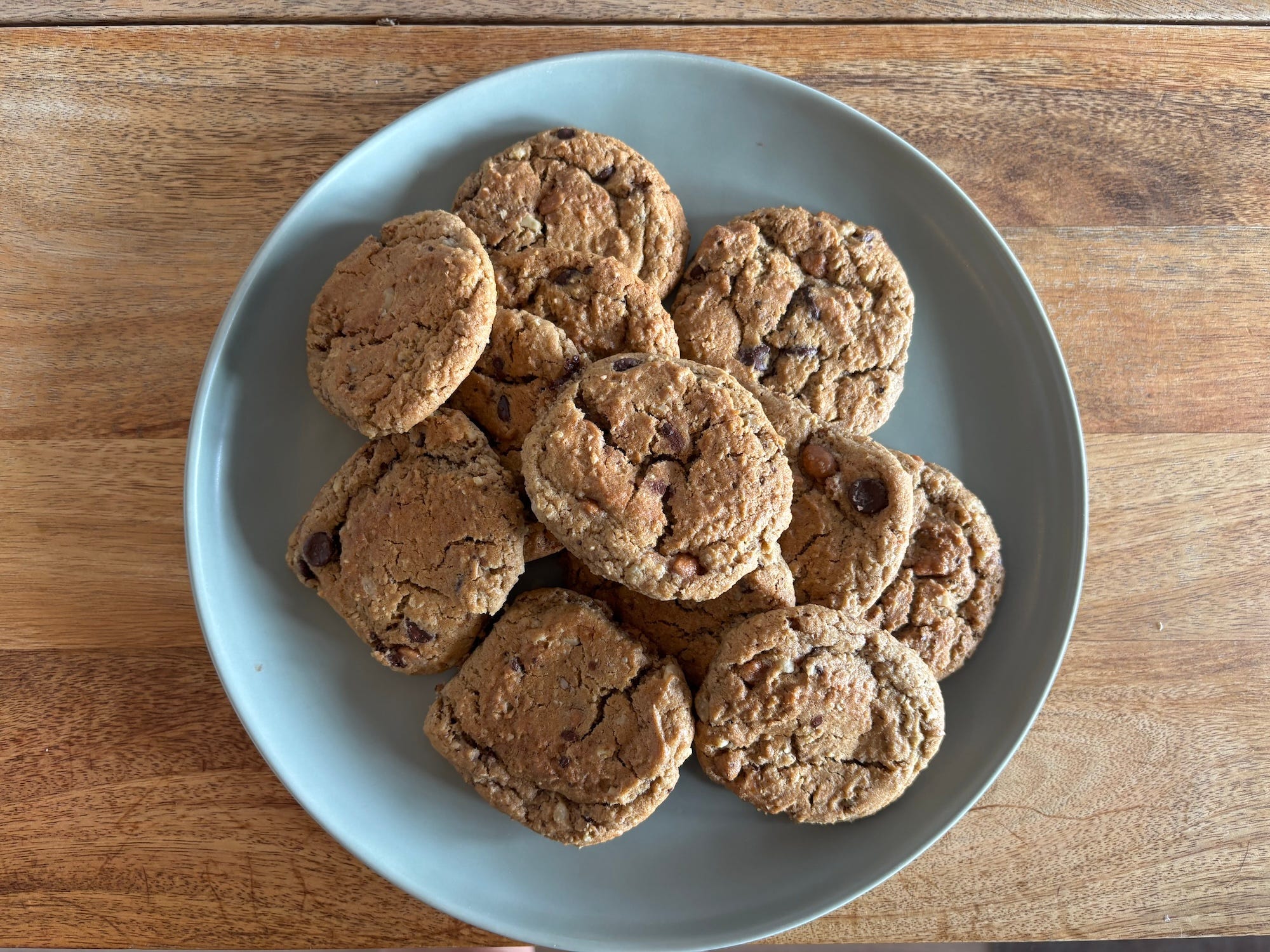 A plate full of peanut butter chocolate chip cookies.