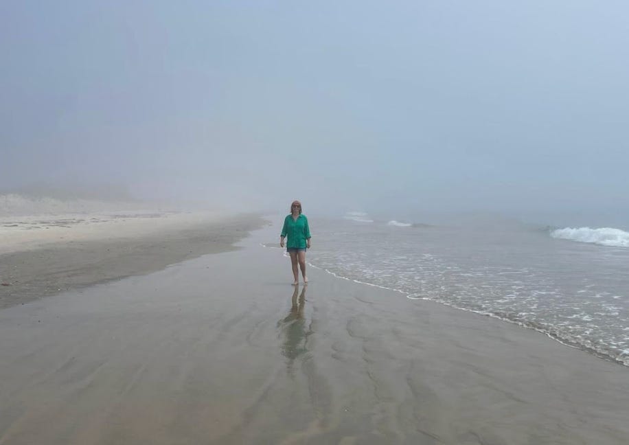 The writer walking down Napatree Beach in Watch Hill, Rhode Island, during the offseason.