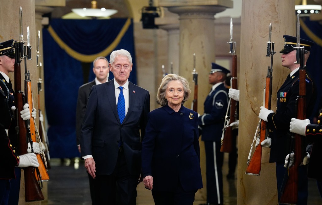 Former President Bill Clinton and former Secretary of State Hillary Clinton arrive at the US Capitol for an inauguration ceremony.