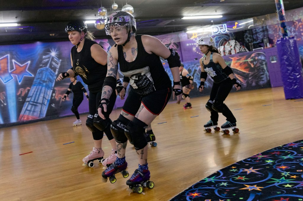 Members of the Long Island Roller Rebels practice roller derby.