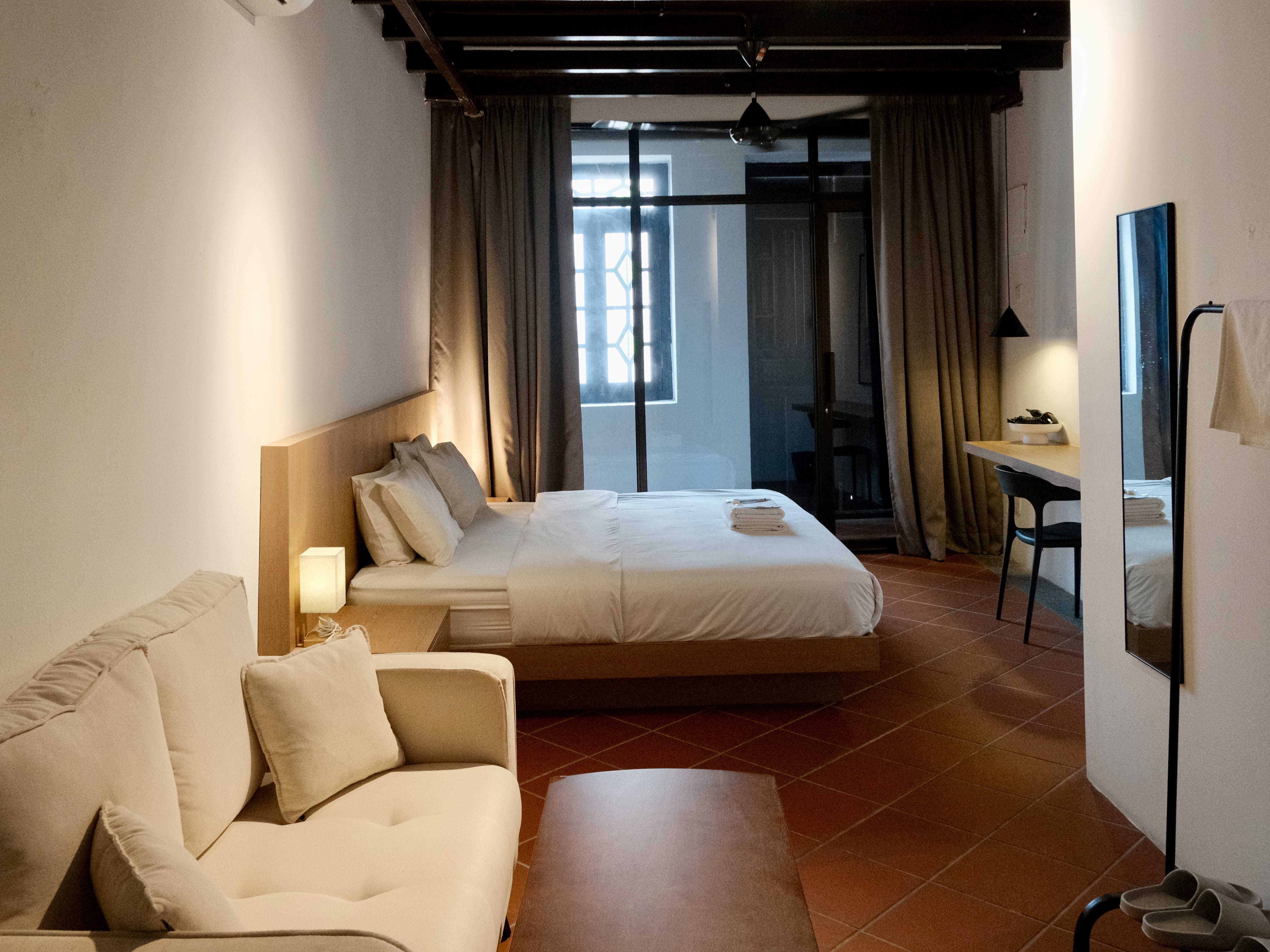 One of the bedrooms in the Aayu Homes shophouse in Penang, Malaysia.