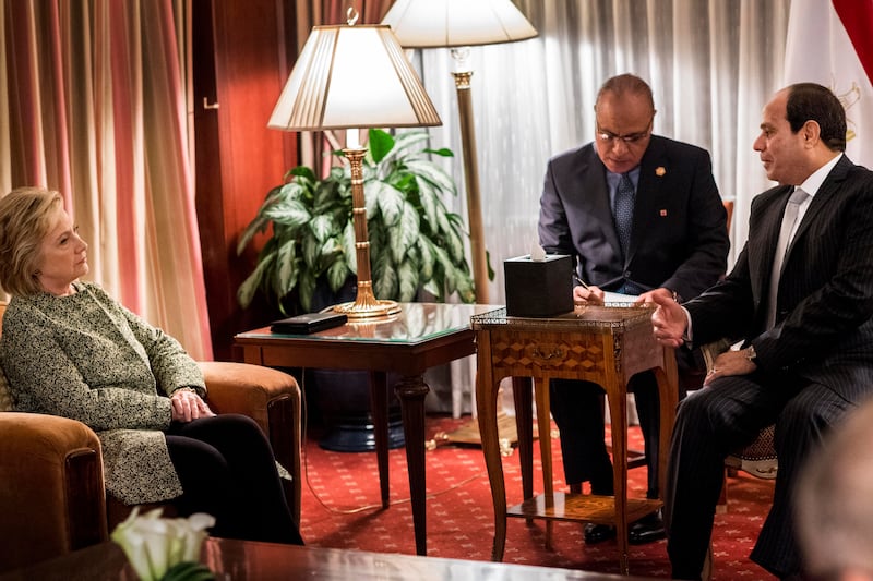 Clinton met with Sisi (right) before Trump did, and spoke with him for