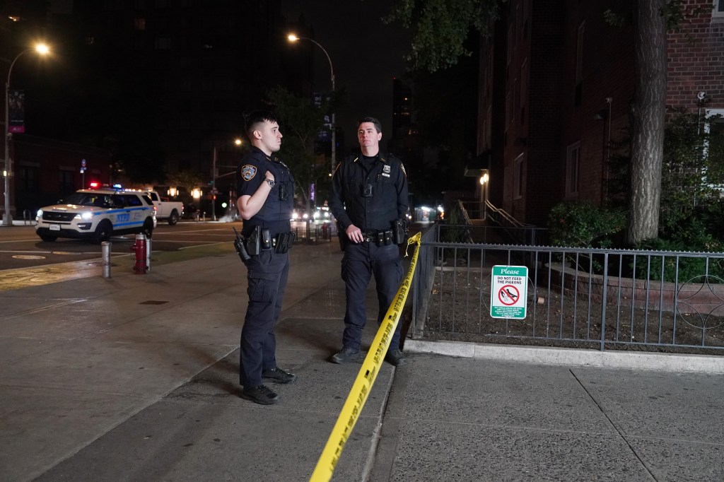 The violent mugger, seen wearing all black, grabbed the 35-year-old woman’s phone at West 58th Street and Ninth Avenue in Hell’s Kitchen around 12:50 a.m. Saturday, police said. 
