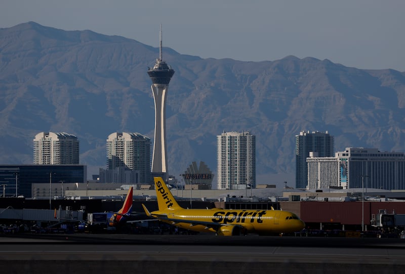 LAS VEGAS, NEVADA - AUGUST 07: A Spirit Airlines plane taxis at Harry Reid International Airport on August 07, 2025 in Las Vegas, Nevada. Las Vegas has seen a drastic 7 percent decrease in tourism since the start of the year, largely due to rising travel costs and a Canadian boycott of travel to the United States, stemming from political tensions. Unemployment in the city surged to 5.8 percent in June, the third-highest among major U.S. metropolitan areas with populations exceeding one million. Las Vegas real estate is also taking a huge hit with an over 10 percent decline in year-over-year sales, and inventory has skyrocketed by 44.8 percent. (Photo by Justin Sullivan/Getty Images)