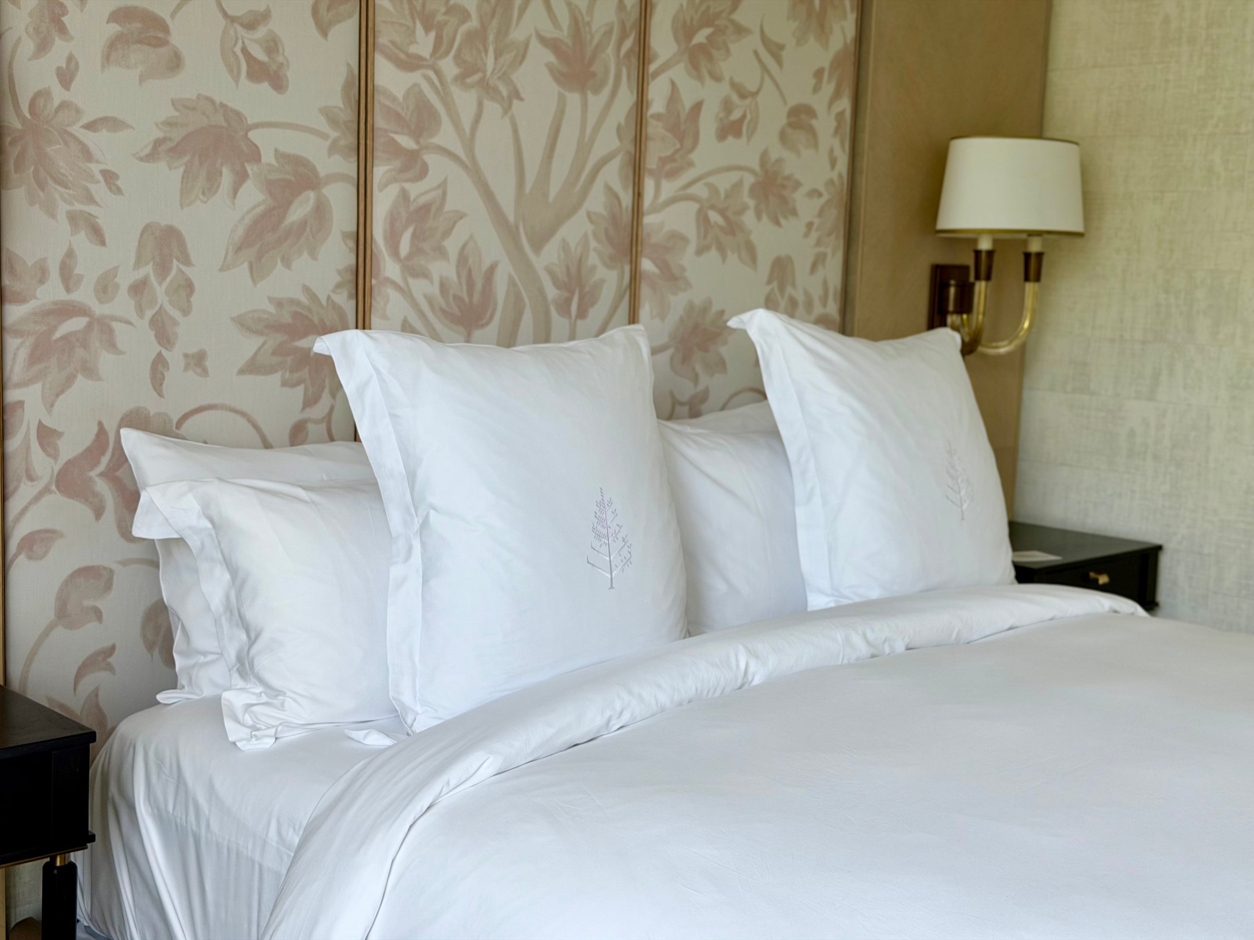 A close-up of the pillows on a bed at the Four Seasons.