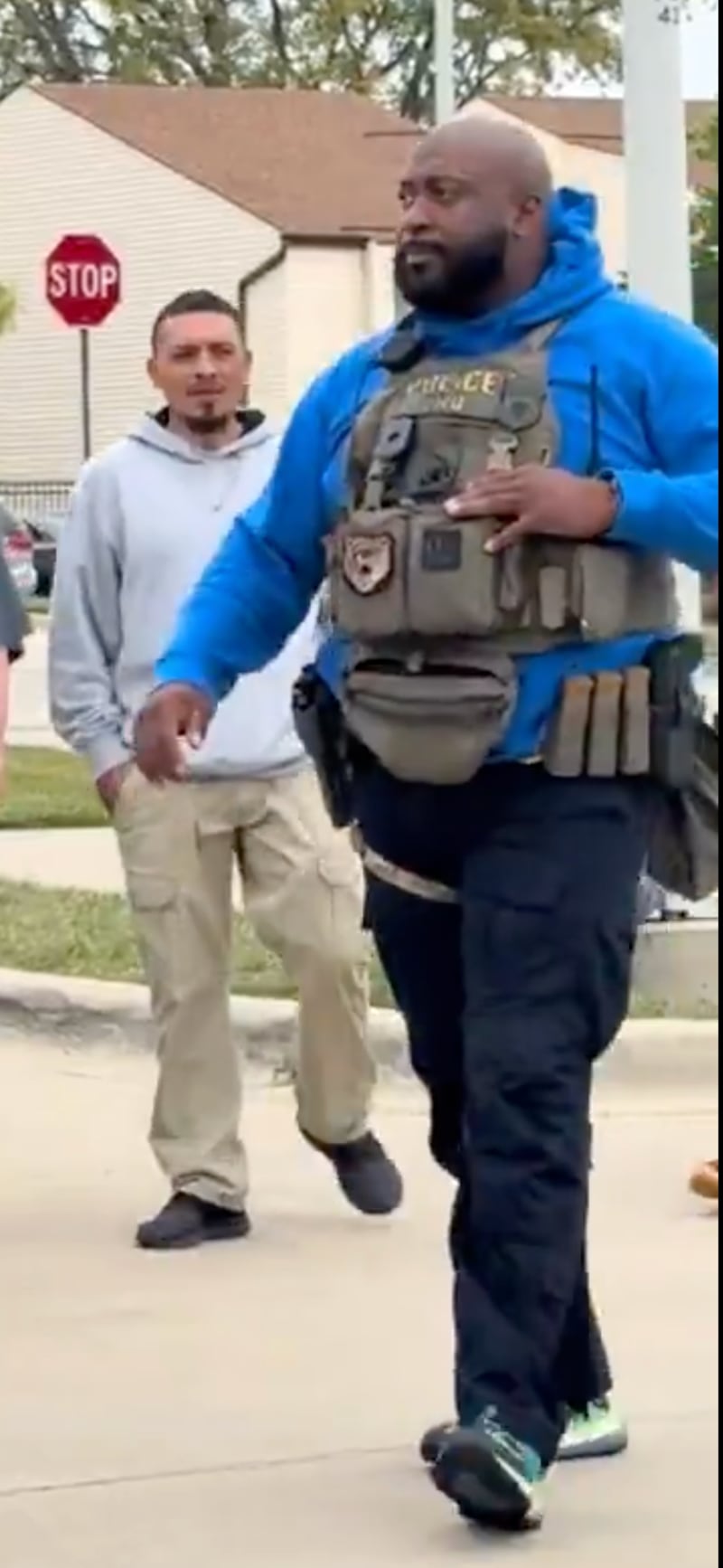 The same man, later filmed walking into Hoffman Estates Police Department.