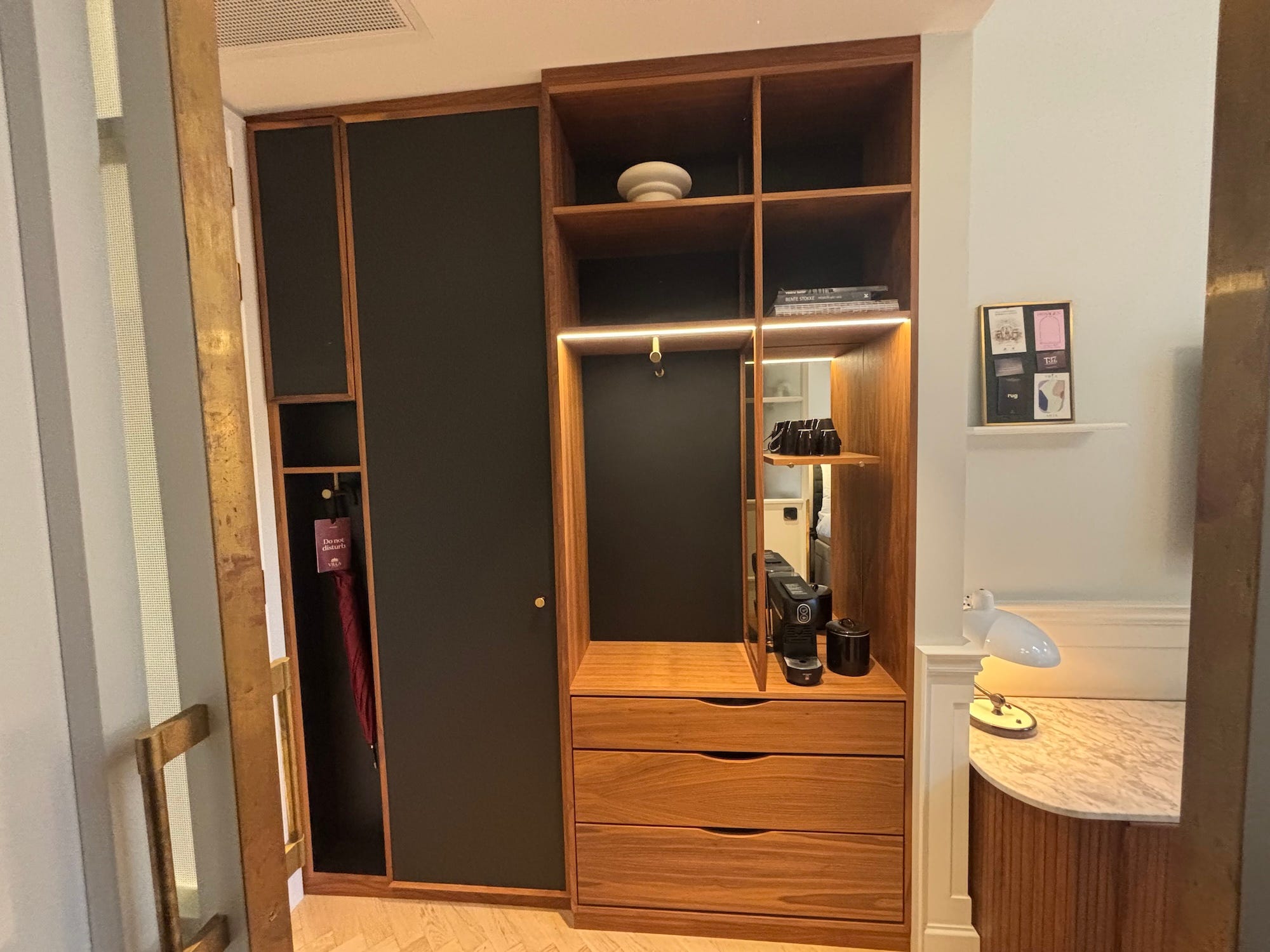 A wardrobe in a hotel room.