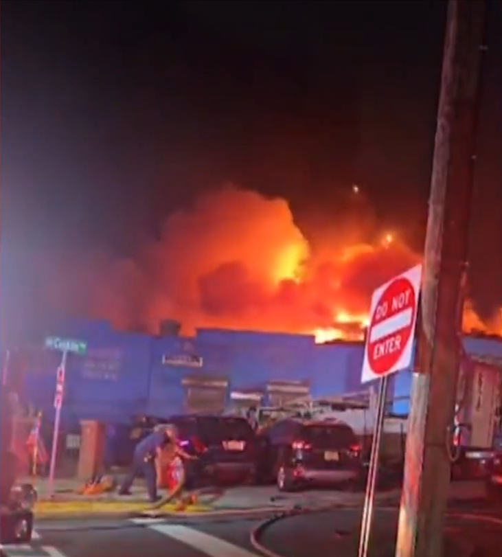 At least six or seven businesses, including a flower shop, grocery store, and the auto body shop, were burned in the fire sparked by the explosion around 6:30 p.m., the mayor said.