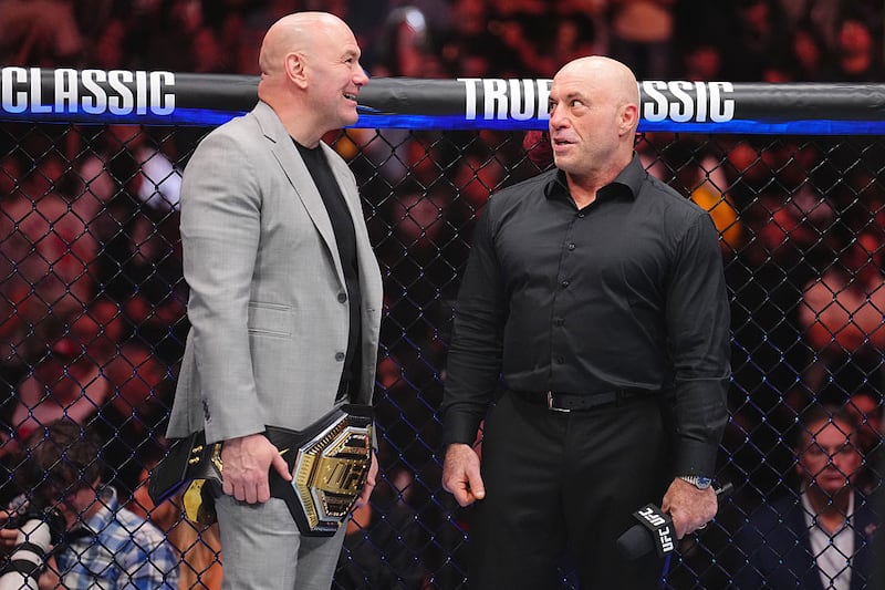 TKO president and CEO Dana White and Joe Rogan look on in the UFC lightweight championship bout during the UFC 317 event at T-Mobile Arena on June 28, 2025 in Las Vegas, Nevada