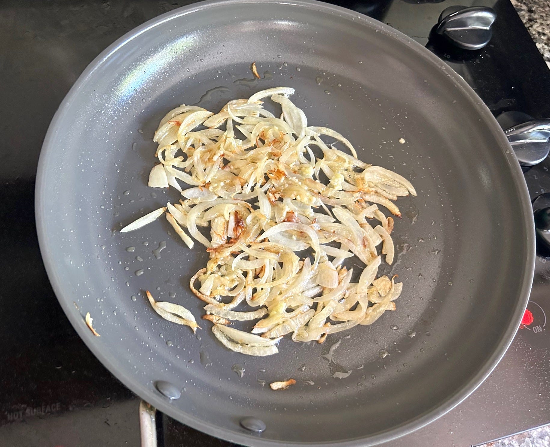 Browning onions for Ina Garten's Eggs in Purgatory