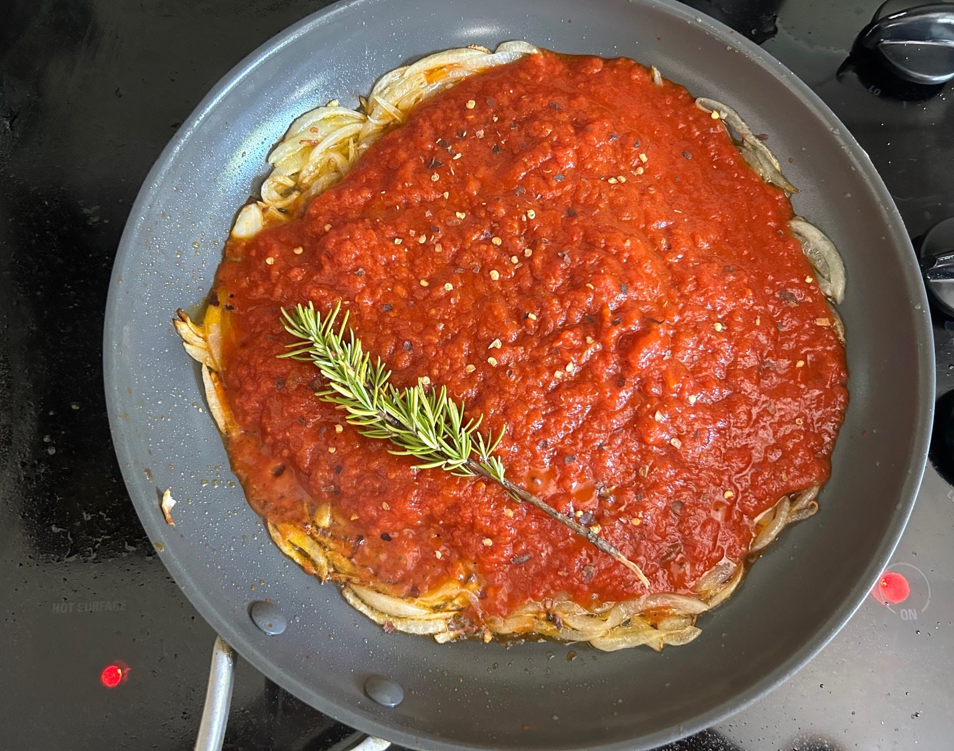Making the sauce for Ina Garten's Eggs in Purgatory
