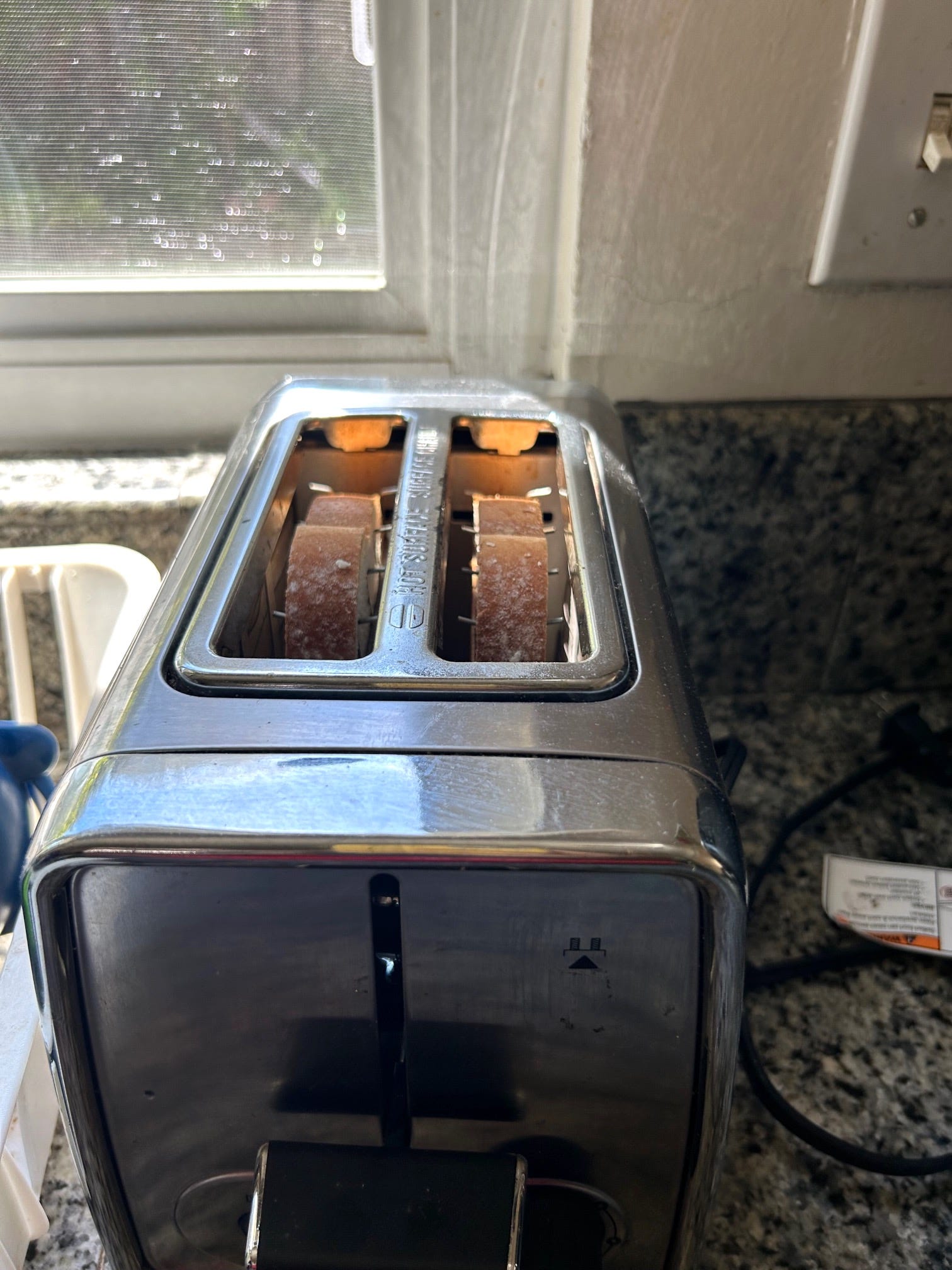 Toasting bread for Ina Garten's Eggs in Purgatory
