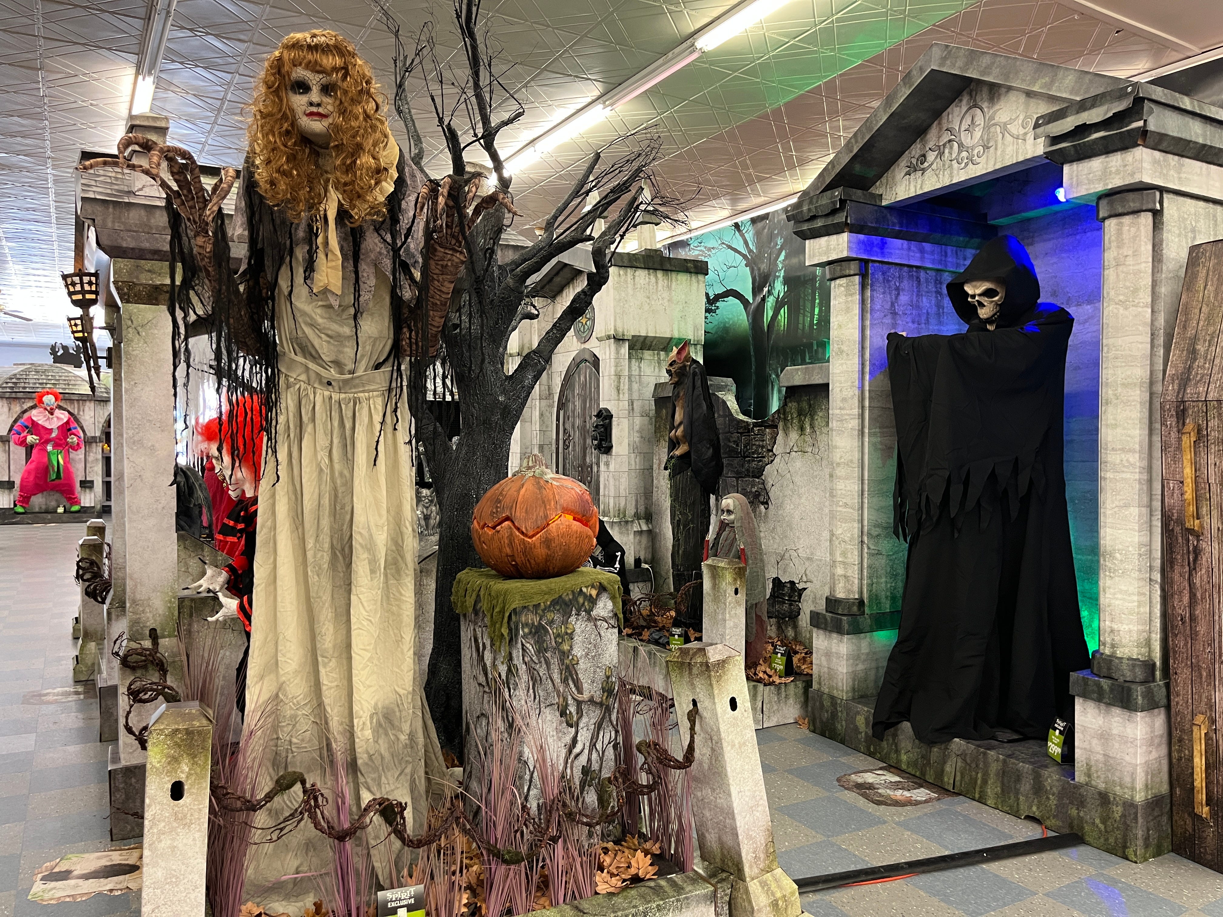 Large animatronics on display at Spirit Halloween.