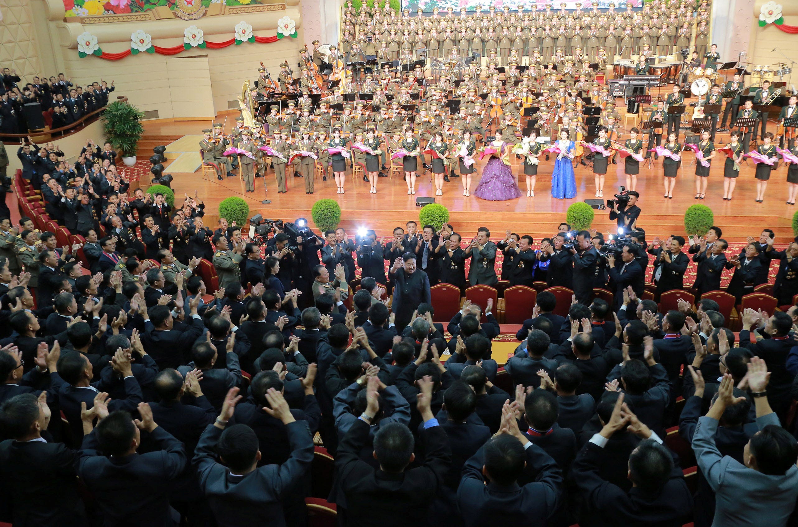 Kim Jong Un reacts during a celebration for nuclear scientists and engineers who contributed to a hydrogen bomb test