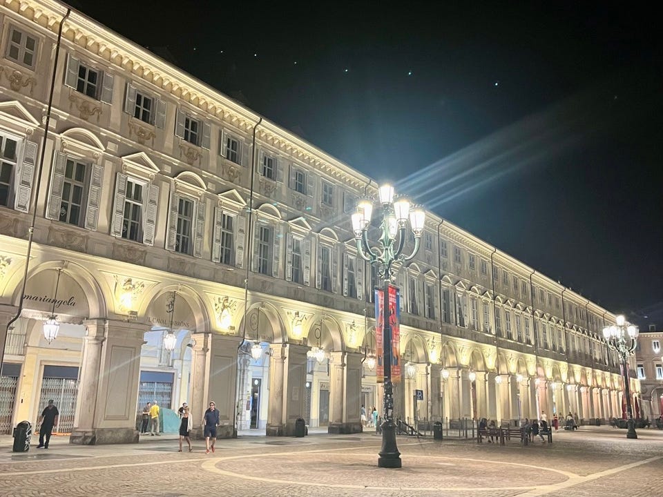 Building in Turim with arches at night
