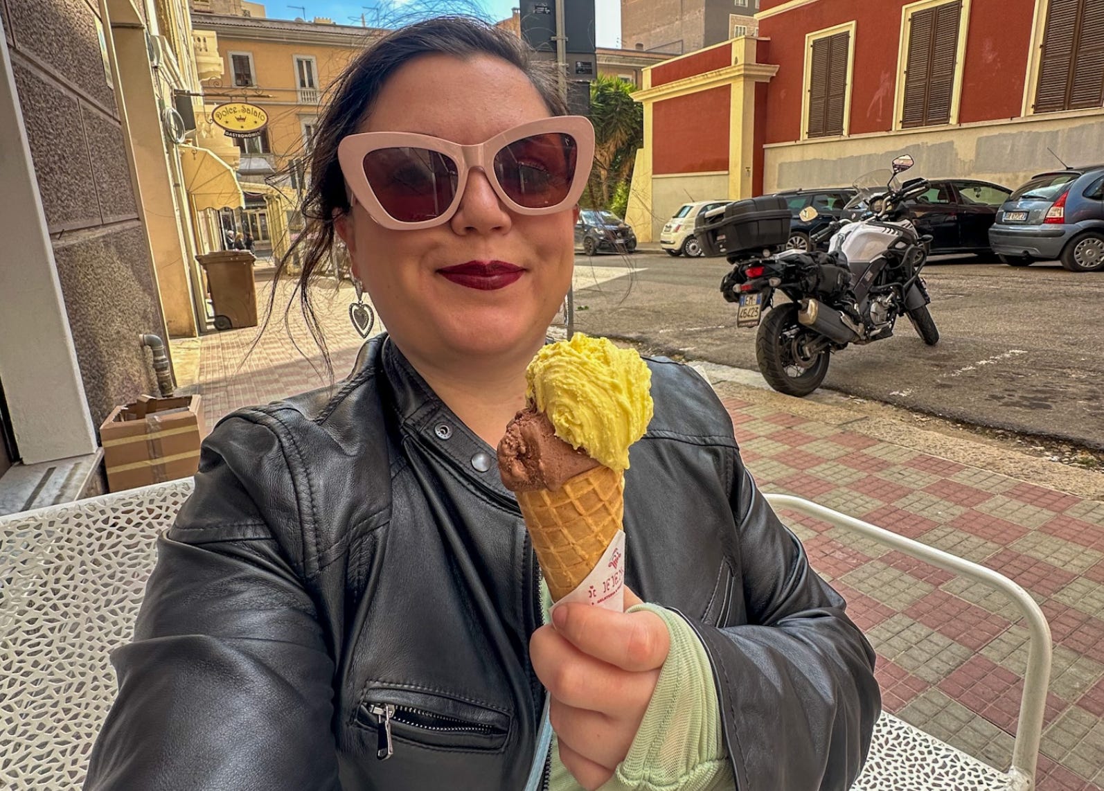 The writer eating gelato in Cagliari.